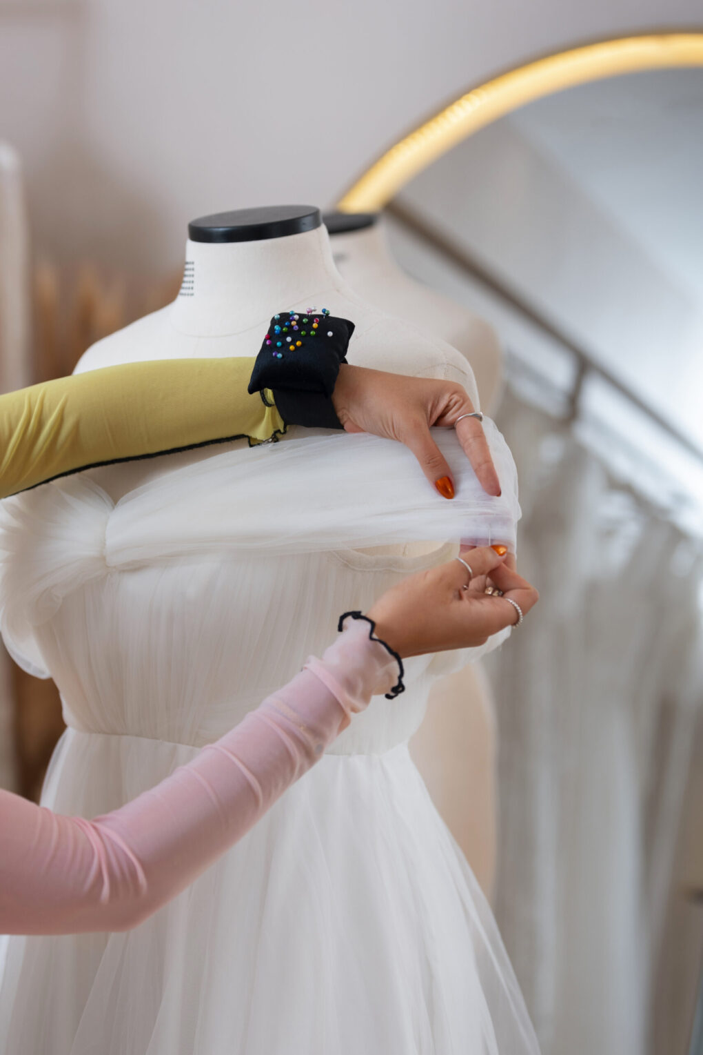 side-view-brazilian-woman-working-as-clothing-designer Alterations on a Wedding dress